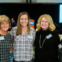 Kim Schmidt and guests posing at Scholarship Dinner 2019